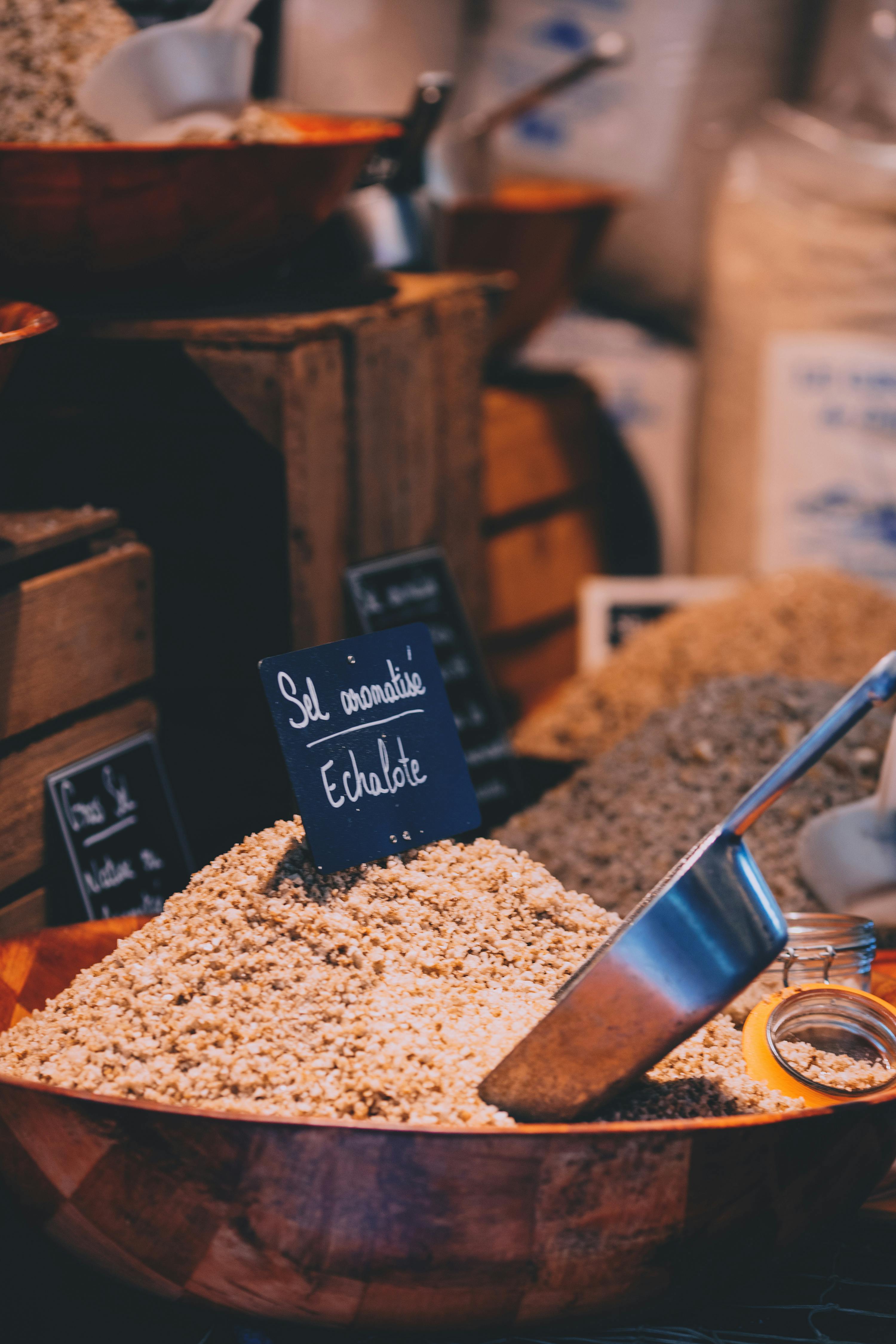 heaped dried shallot onion flakes in spices market