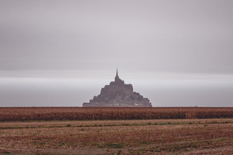 Silhouette Of Majestic Castle Situated On Spacious Valley