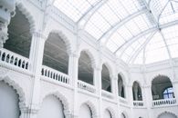 Old masonry building interior with arches in sunlight