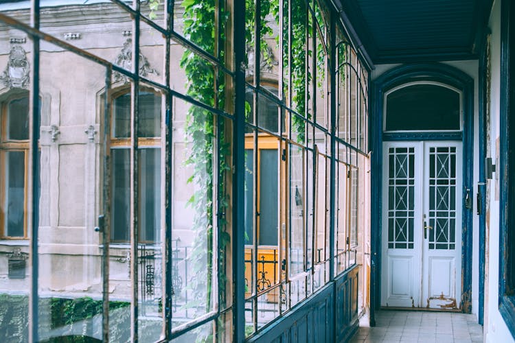 Entrance Of Old Building With Glass Wall