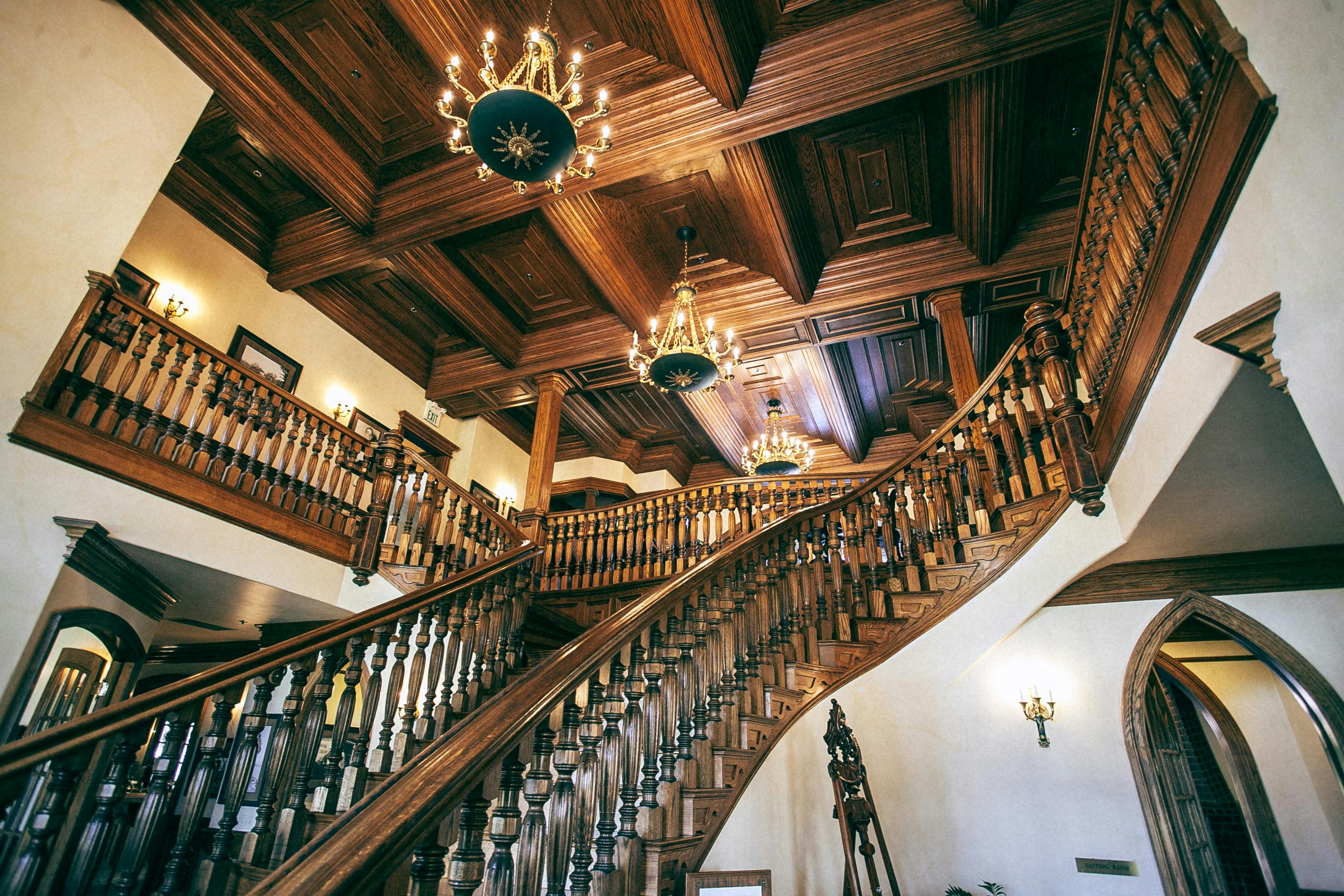 wooden staircase in ornate hall of house