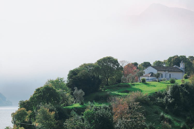 Single House On Green Hill