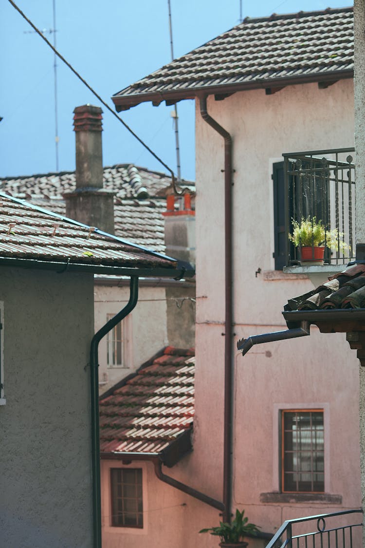 Old Residential Buildings On Narrow Town Street