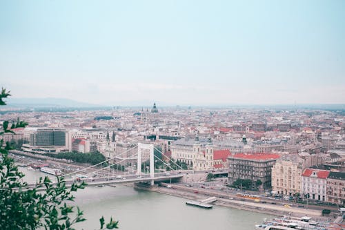 Suspension bridge over river in old city