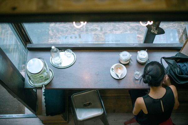Coffee Cafe for Sale: Smart Guide 2026 3 Coffee cafe for sale - customer enjoying coffee in the cafe