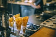 Crispy waffle horns for ice cream balls prepared for delicious dessert in cafe