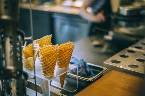 Free Crispy waffle horns for ice cream balls prepared for delicious dessert in cafe Stock Photo