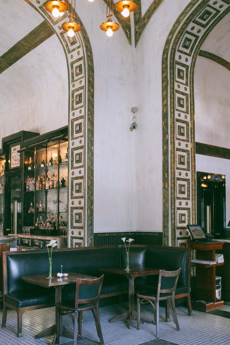 Old Cafe Interior With Furniture And Shiny Chandelier