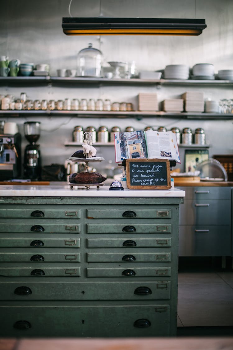 Kitchen Interior With Furniture And Shelves In Cafe