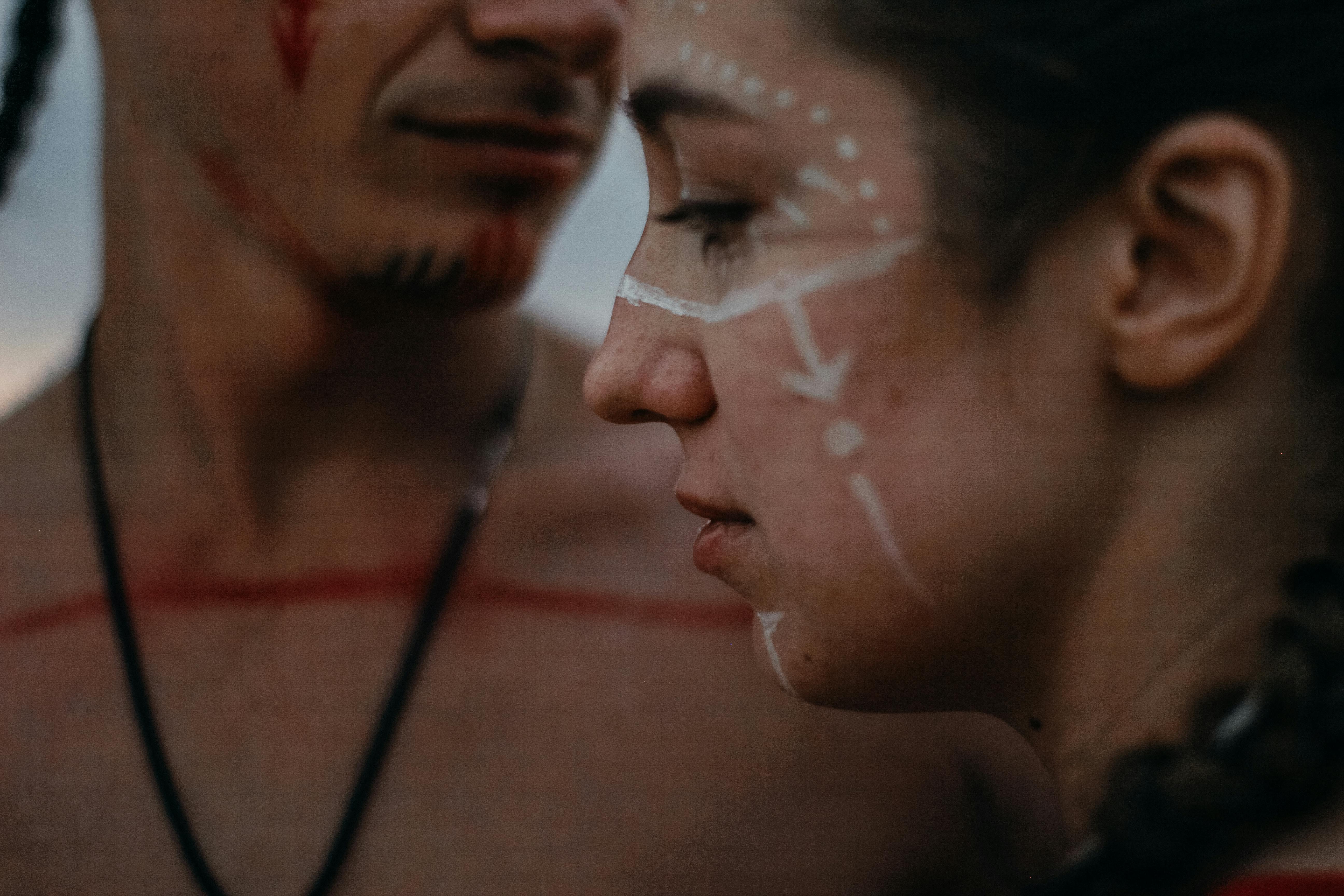 Woman With White Face Paint · Free Stock Photo