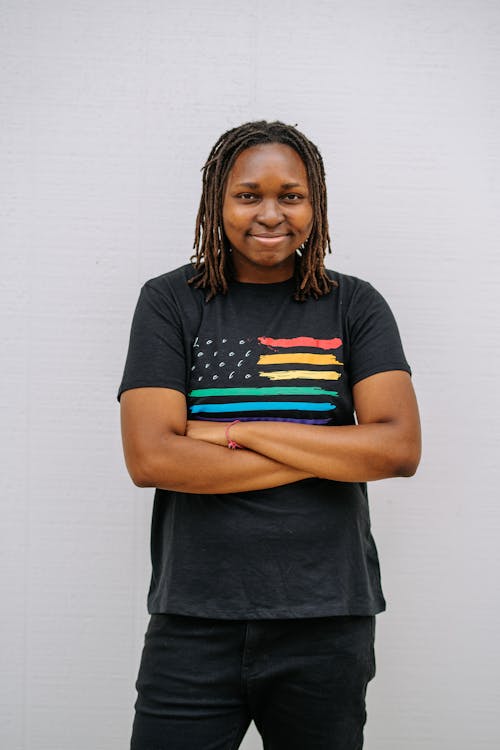 A Smiling Woman in a Gay Pride Shirt