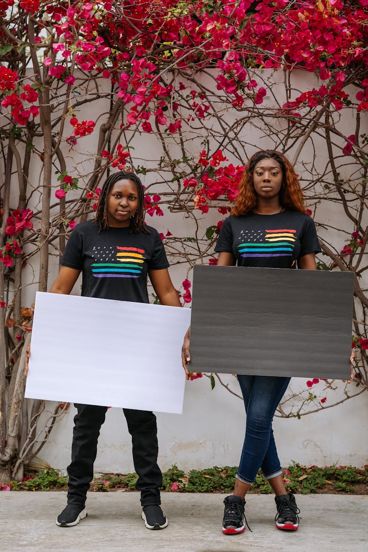 Women Holding Blank Placards