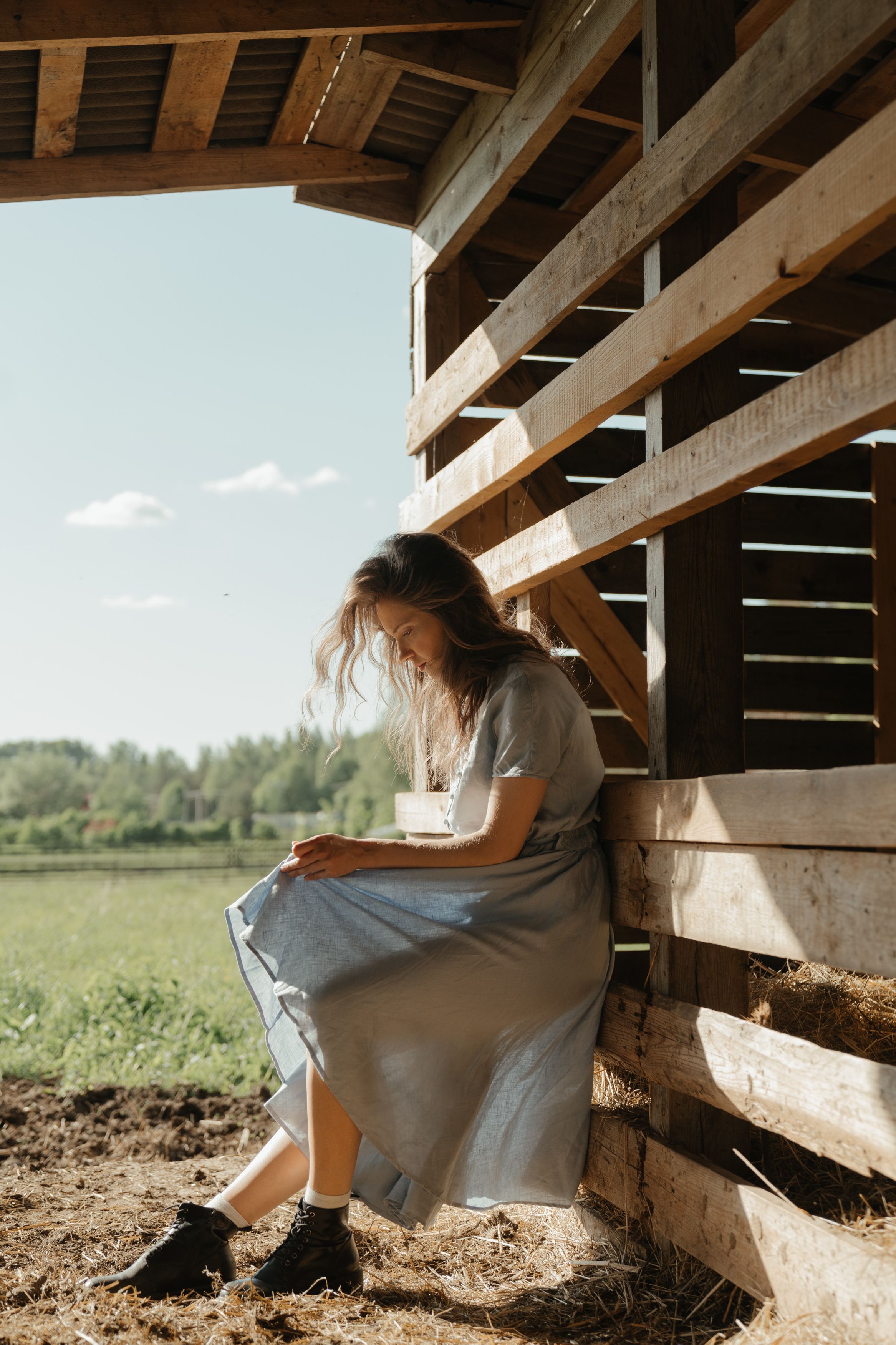 Woman in White Shirt Standing on Green Grass Field · Free Stock Photo