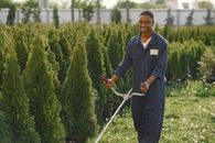 Maintenance Man controlling a Lawn Mower