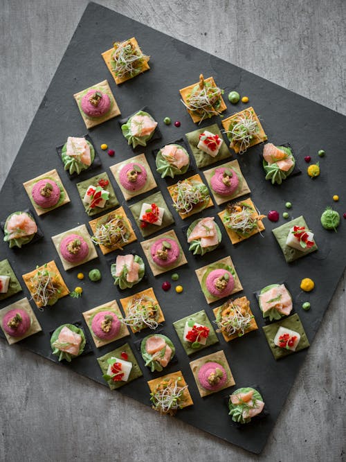 An Arrangement of Food on Crackers