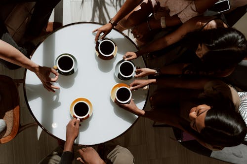 Free Coffee Drink on Ceramic Cups on Table Top Stock Photo