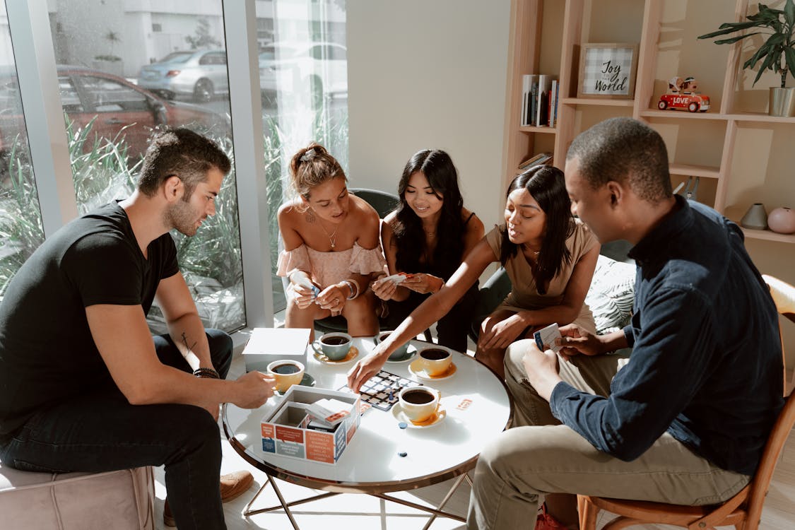 Free Group of Friends hanging out on a Cafe Stock Photo