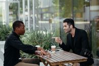 Two Men Having a Conversation