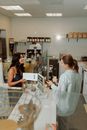 Barista Taking Orders from a Customer