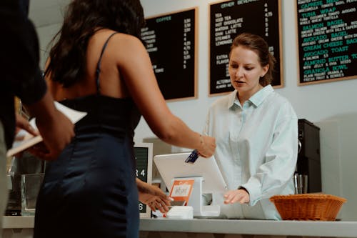 Free A Customer Paying Through Credit Card Stock Photo