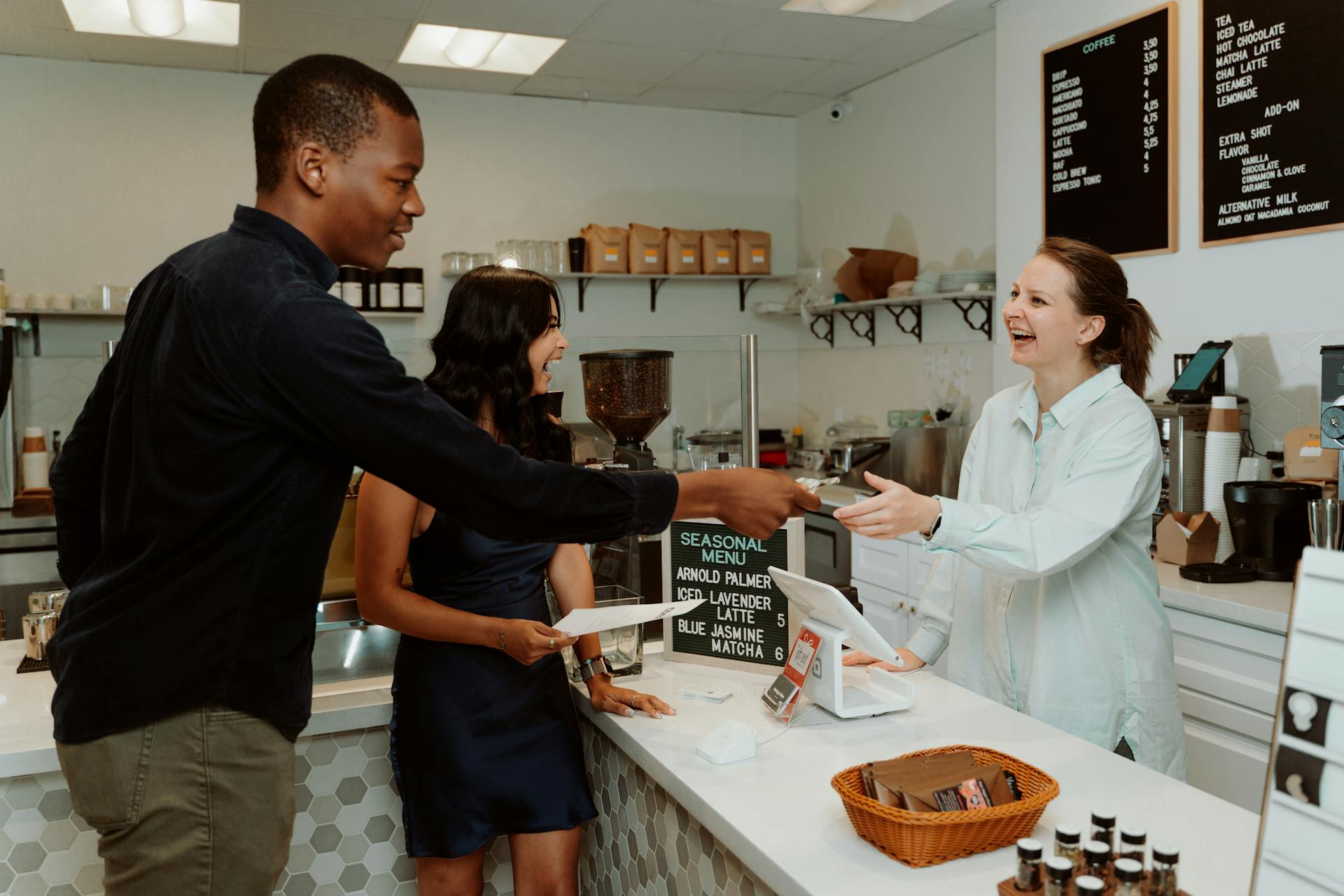 A Man Paying Bills to the Cashier