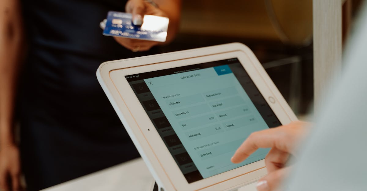 Close-Up Shot of a Person Taking Orders Through Order Terminal · Free ...