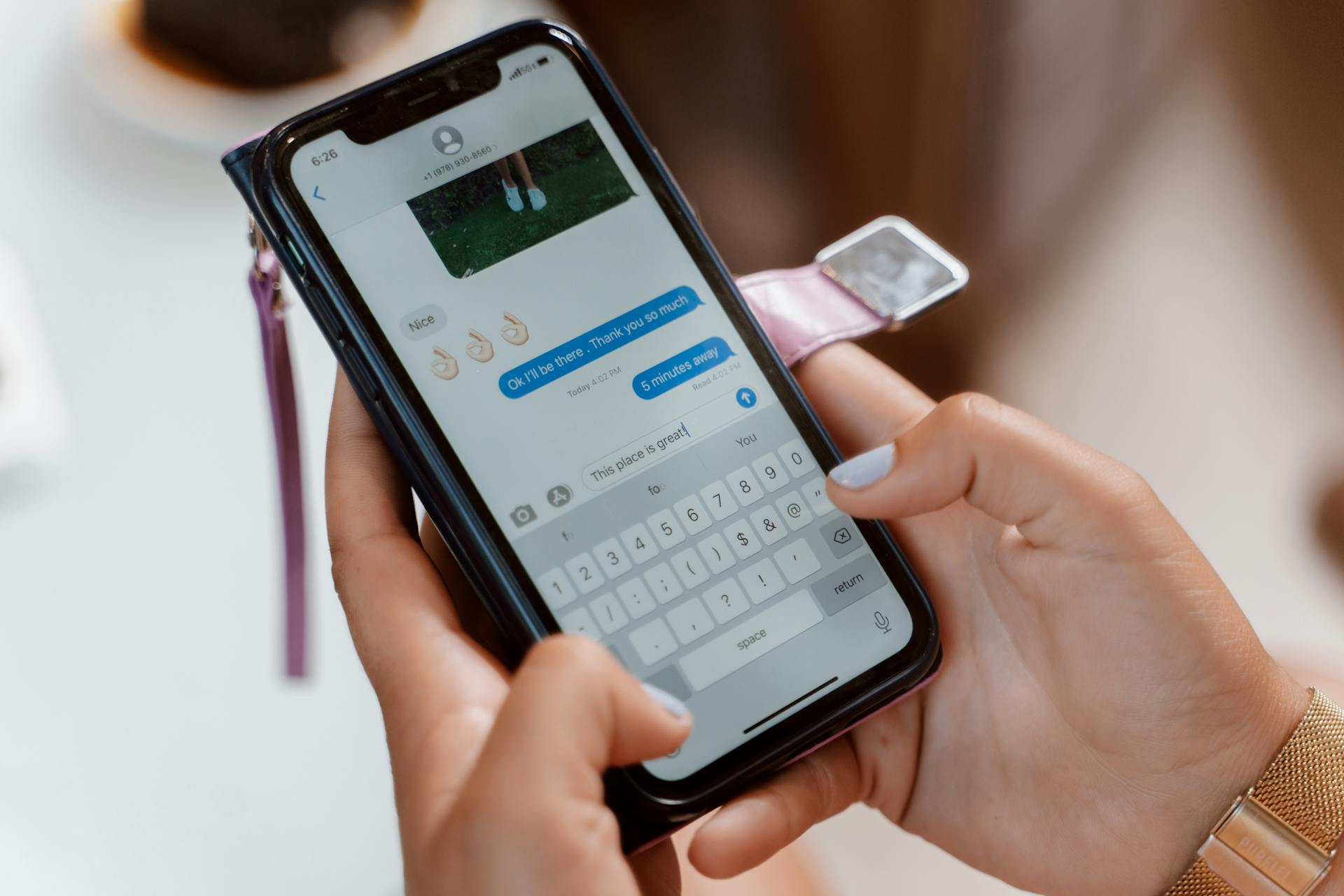 Close-Up Shot of a Person Sending Text Message