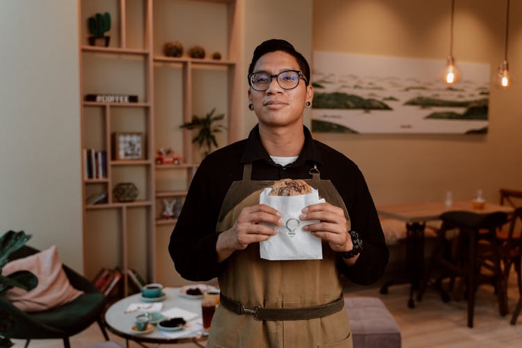 A Waiter Holding Chocolate Chip Cookies