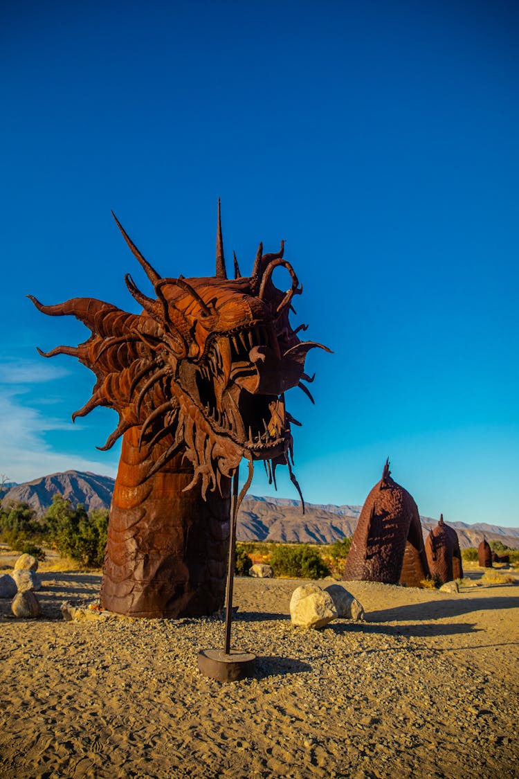 Brown Metal Dragon Sculpture In Borrego Springs California