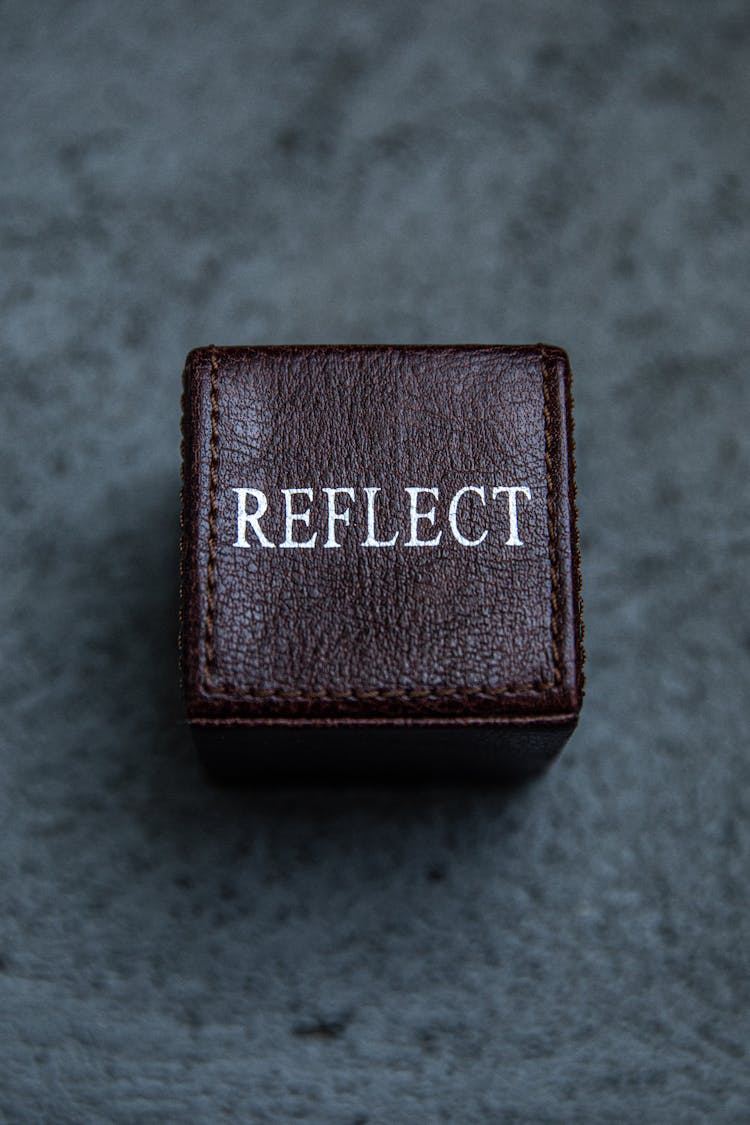 A Square Leather Box With Label 