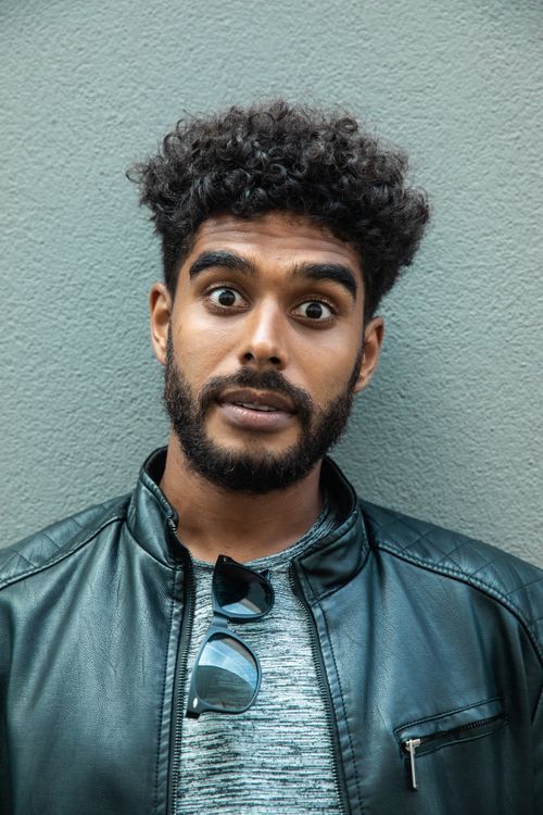A Bearded Man Wearing a Leather Jacket · Free Stock Photo
