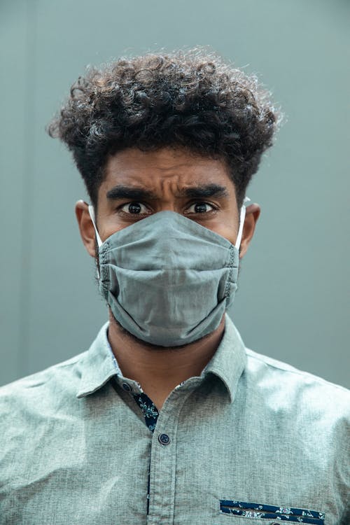 Man in Gray Collared Shirt Wearing Face Mask