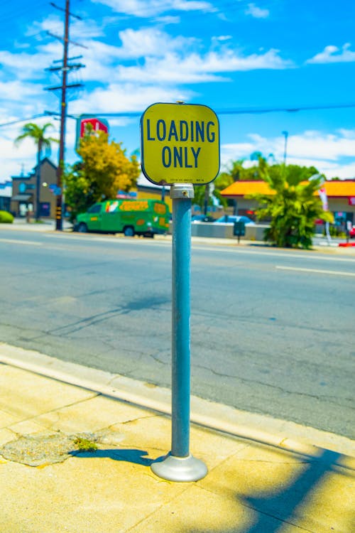 Free Street Sign on the Side of a Road Stock Photo