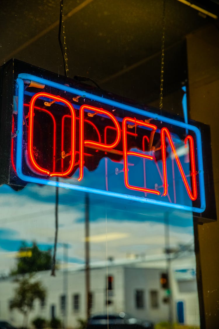 Close Up Photo Of A Open Neon Signage