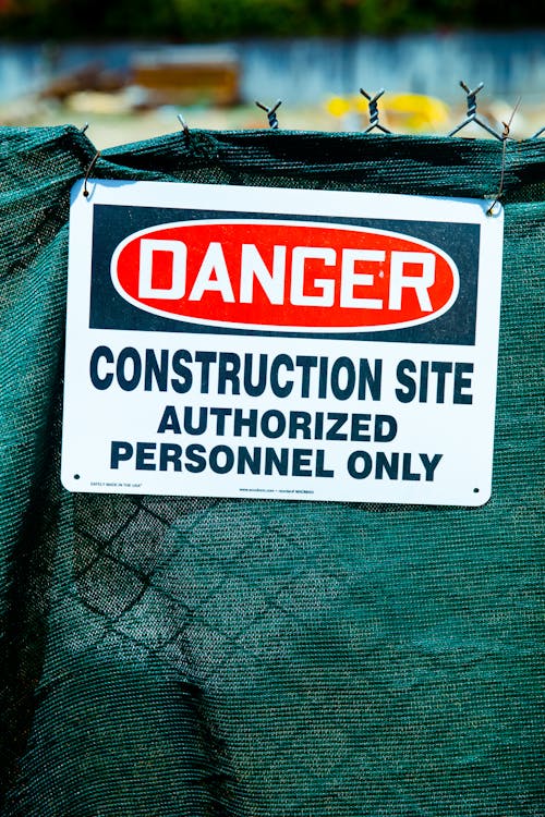 Danger Sign on a Wire Fence