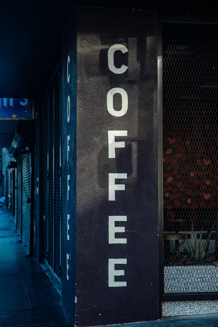 Coffee Signage On A Concrete Column