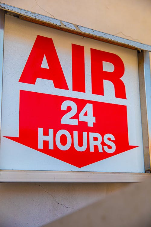 Free Red and White Air Signage Stock Photo