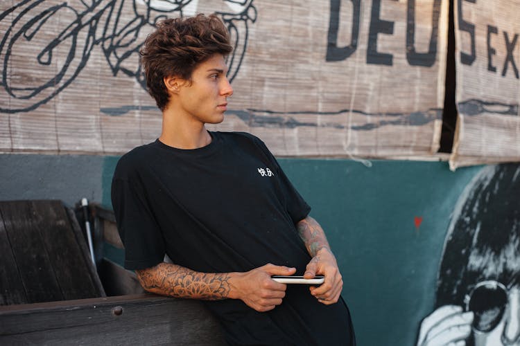 Man Posing In Black Tshirt