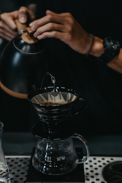 Close up of a Person Brewing Coffee