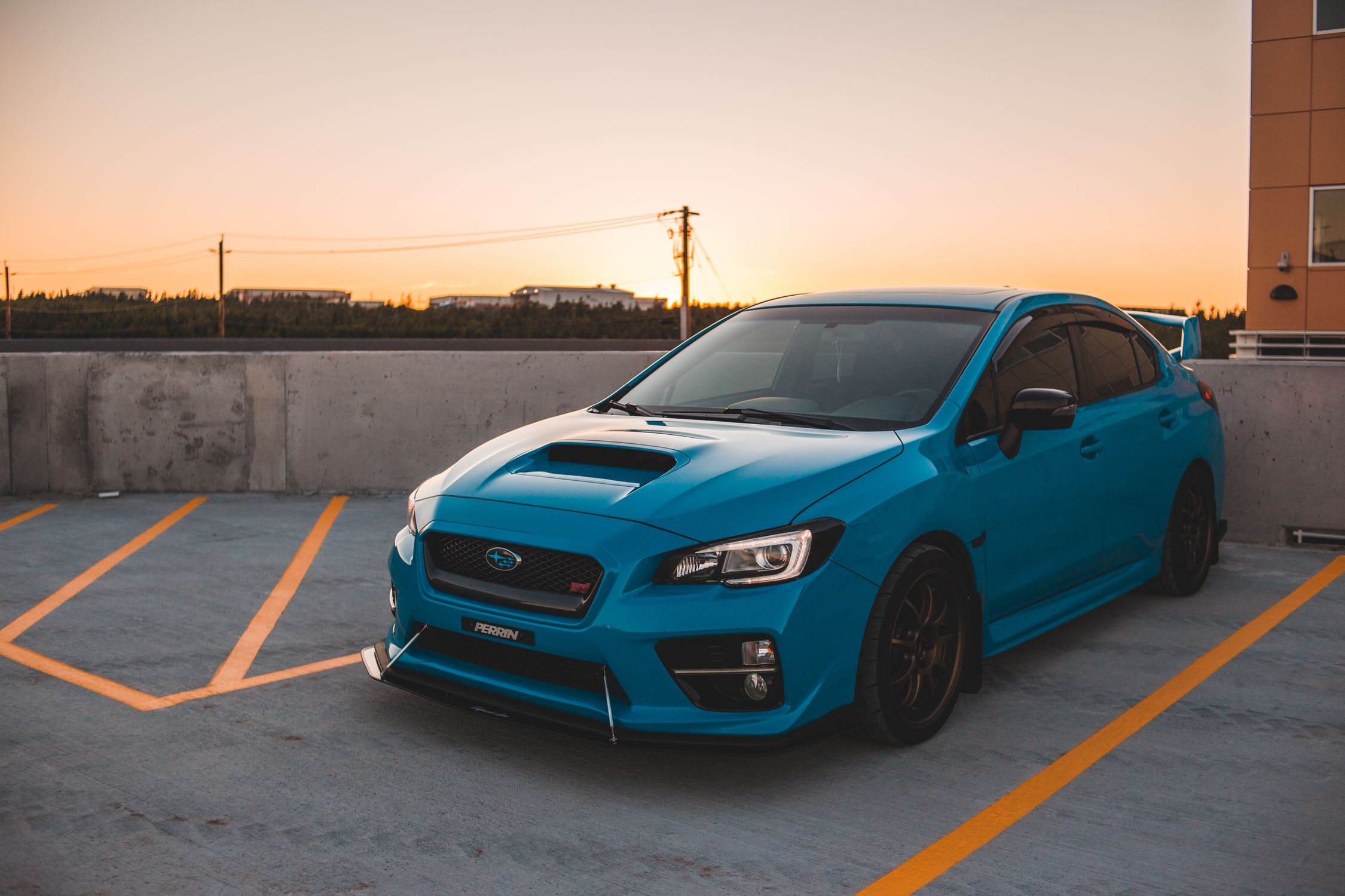 Blue Rectangular Car Contemporary blue car on parking lot · Free Stock Photo