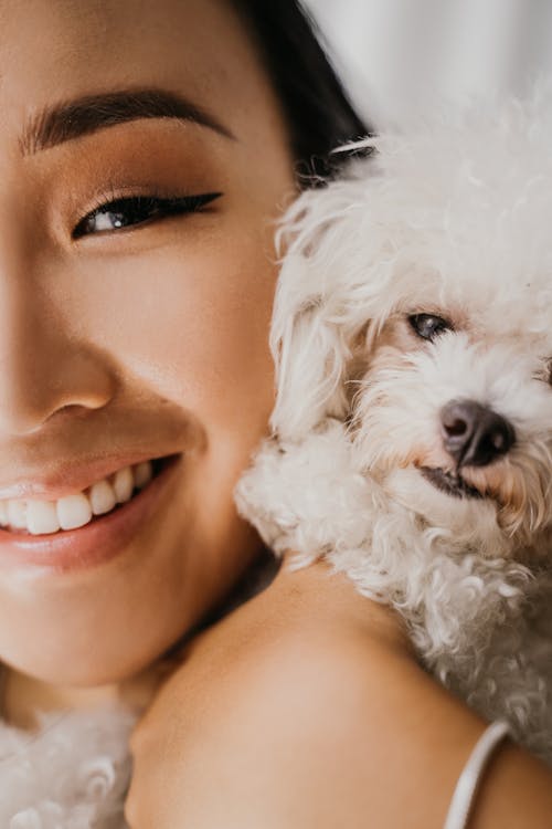 Free Portrait of a Woman and her Dog Stock Photo