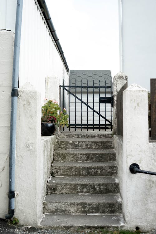 Concrete Staircase with a Small Gate
