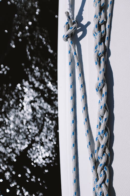 Blue and White Rope on White Wooden Frame