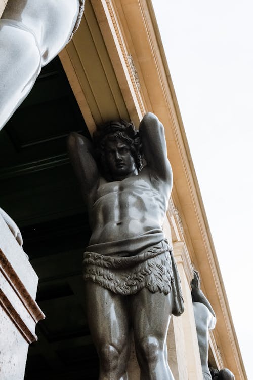 Angel Statue Under White Sky