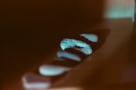 Collection of rough stones on table at home