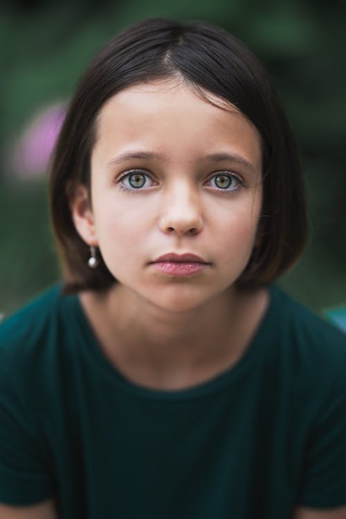 Free Serious girl with short brown hair Stock Photo