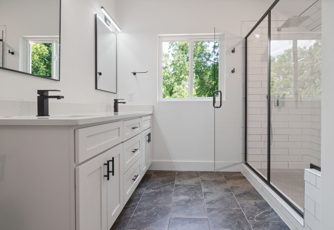 White towel on a metal towel bar in a bathroom