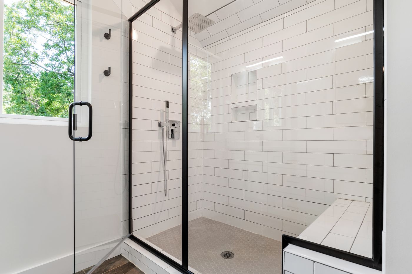 Glass shower door in a modern bathroom
