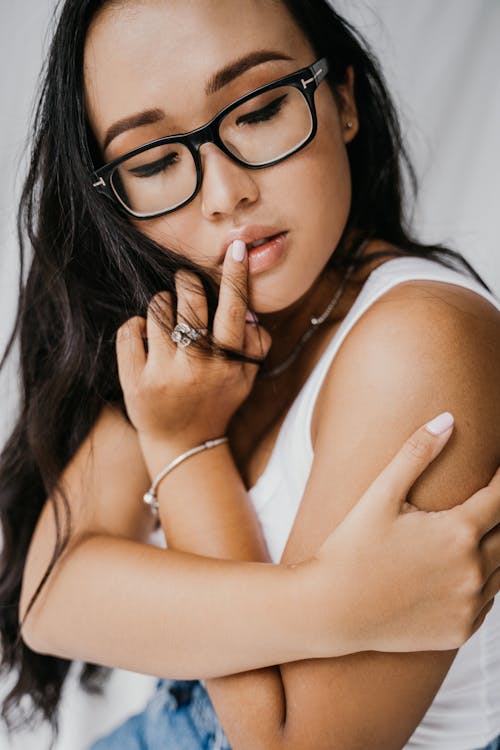 Free Close-up of a Beautiful Woman Wearing Eyeglasses Stock Photo