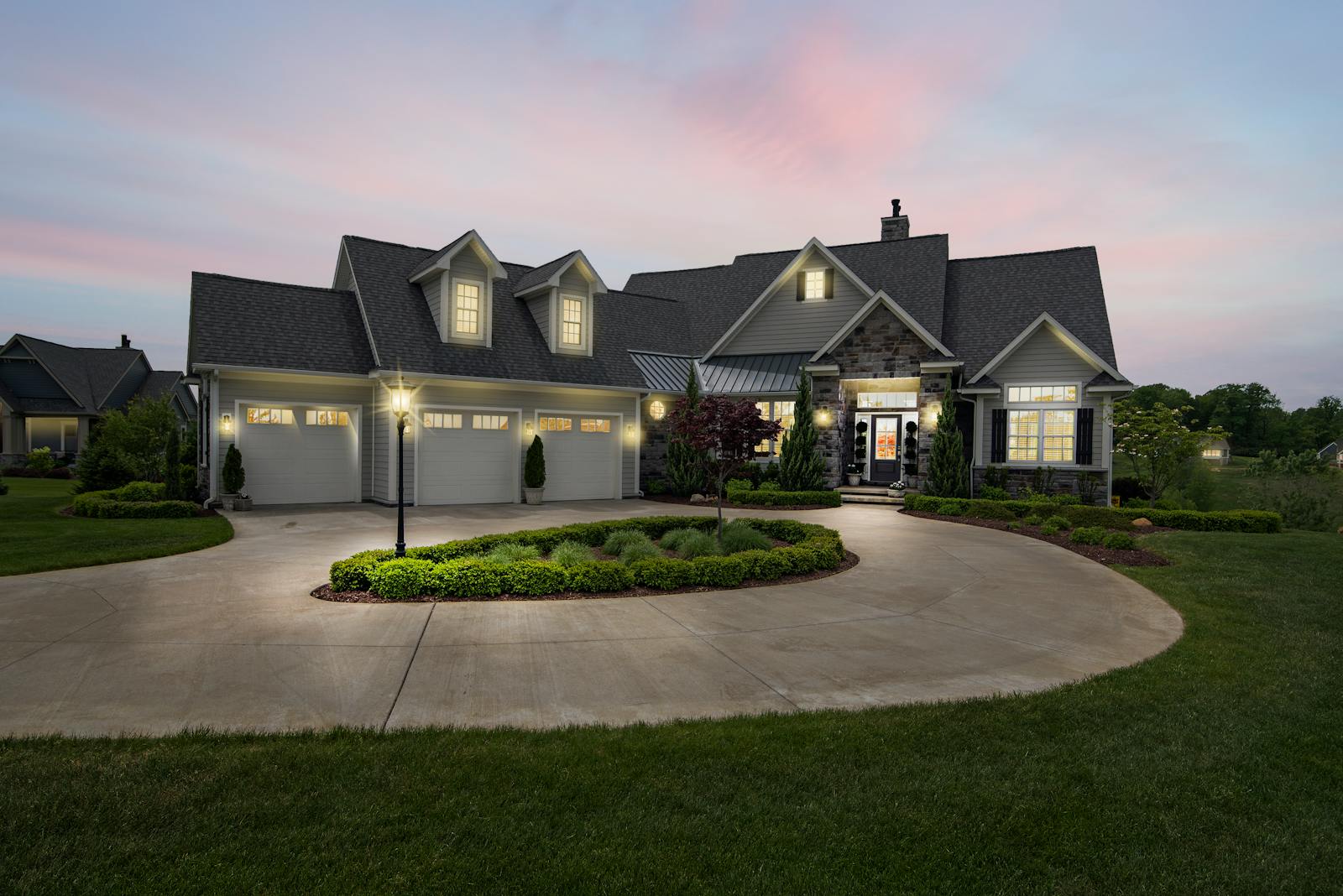 Luxury custom home in Greater Milwaukee with modern architecture and warm interior lighting